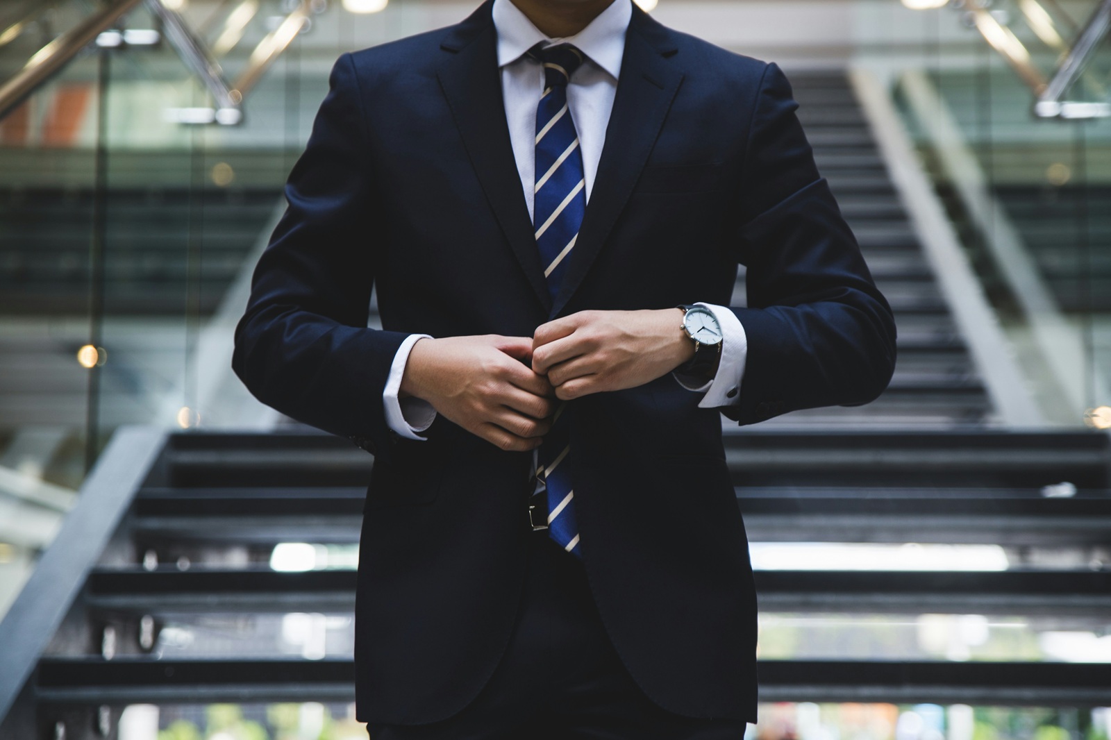 Business team dressed in tailored suits from Bond & Co